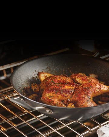 Circulon product image showing A1 sizzling chicken in non stick pan